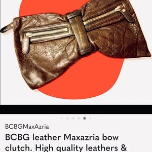 BCBG Dk brown/ black Italian Leather Clutch with Gold high quality hardware.